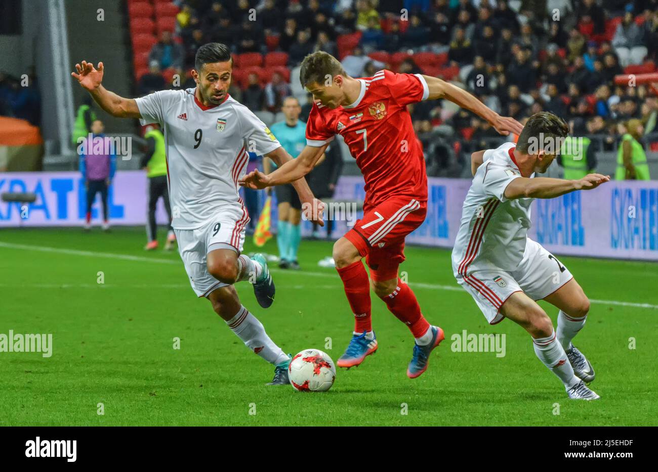 Kazan, Russia – October 10, 2017. Iran national football team midfielder Omid Ebrahimi against Russia striker Dmitry Poloz during international friend Stock Photo