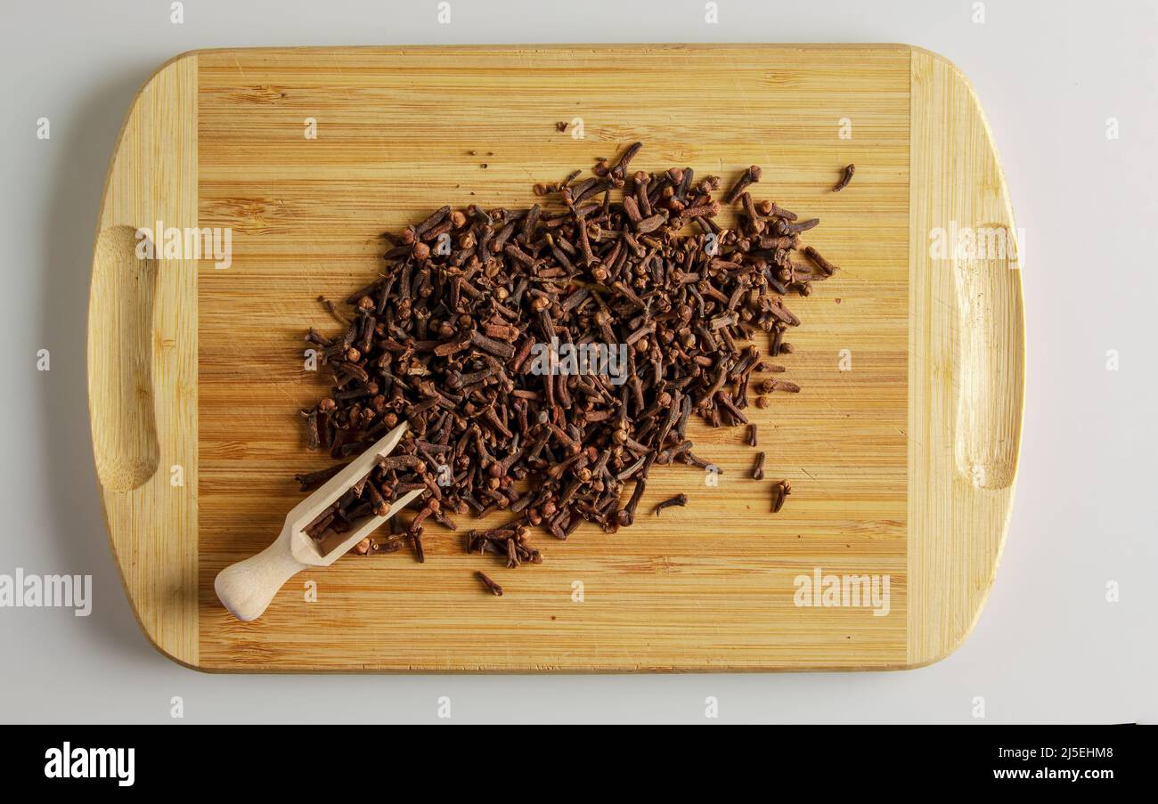 Spice clove. Aromatic spice for food. Background of dried clove seeds