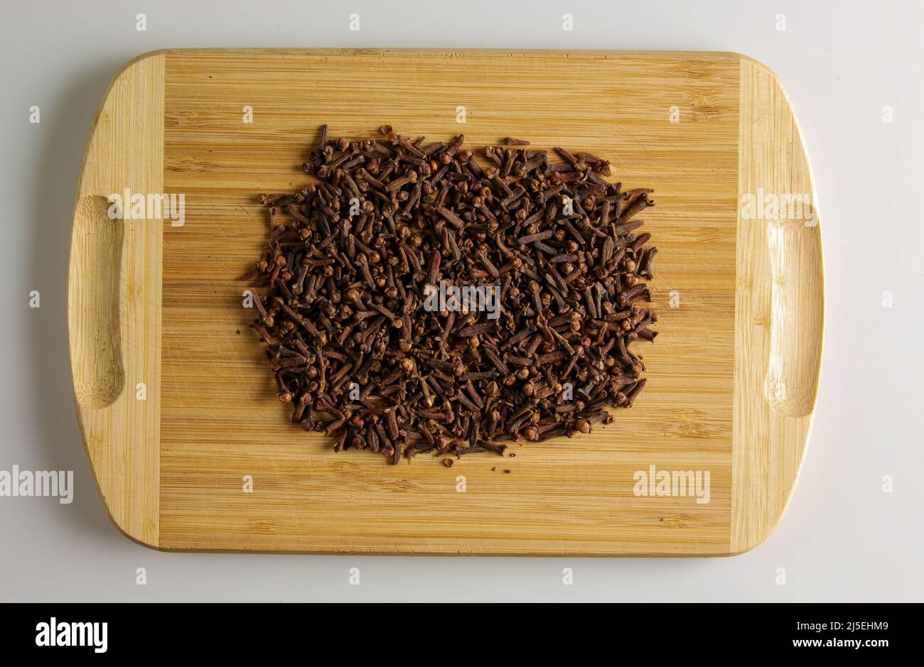 Spice clove. Aromatic spice for food. Background of dried clove seeds