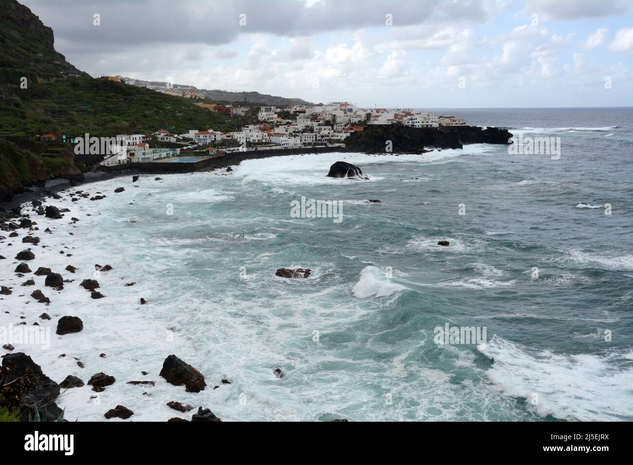 Whitewashed homes in the area of Las Aguas, in the town of San Juan de la Rambla, on the northern Atlantic coast of Tenerife, Canary Islands, Spain. Stock Photo