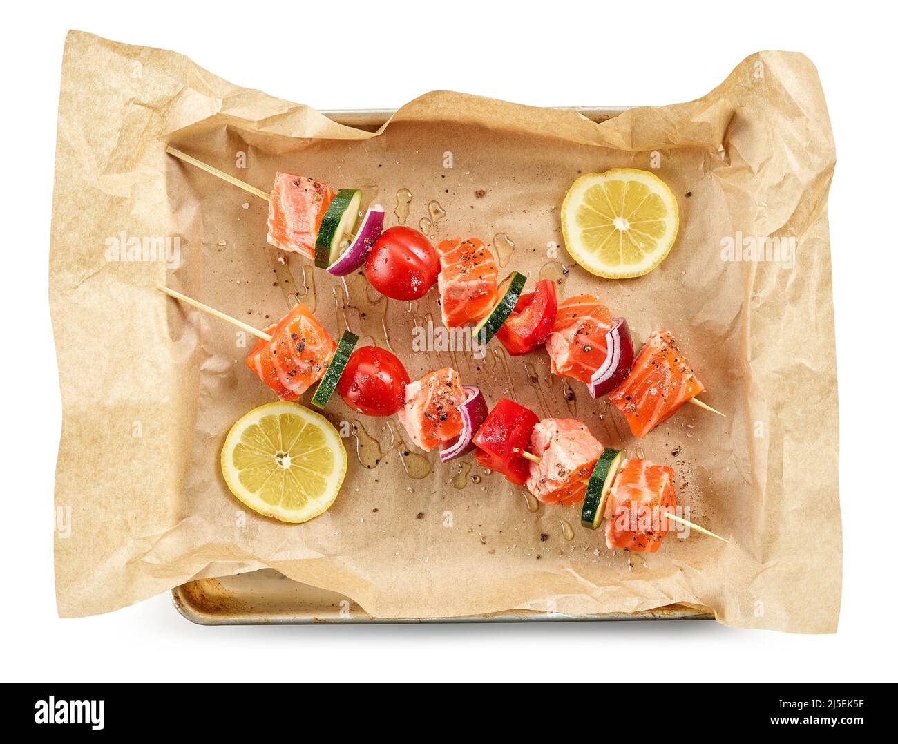 raw salmon and vegetable skewers on oven pan, top view Stock Photo Alamy