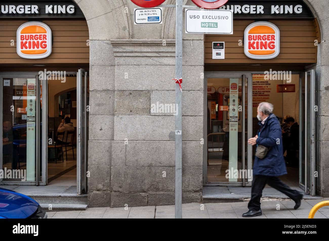Madrid, Spain. 3rd Apr, 2022. A pedestrian walks past the American fast-food hamburger Burger King restaurant chain in Spain. (Credit Image: © Xavi Lopez/SOPA Images via ZUMA Press Wire) Stock Photo