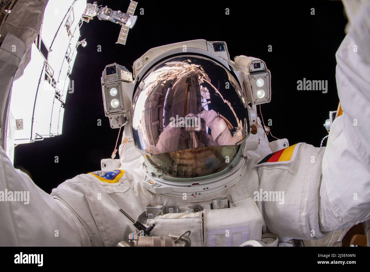 International Space Station, EARTH ORBIT. 23 March, 2022. ESA astronaut and Expedition 66 Flight Engineer Matthias Maurer takes a selfie during a six-hour and 54-minute spacewalk to install thermal gear and electronic components on the International Space Station, March 23, 2022 in Earth Orbit.  Credit: NASA/NASA/Alamy Live News Stock Photo