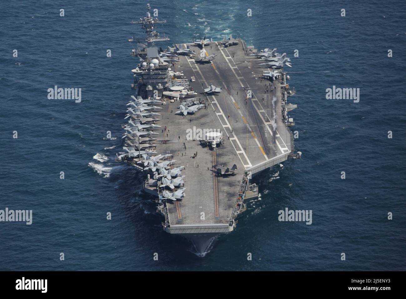 USS Abraham Lincoln, Japan. 13 April, 2022. The U.S. Navy Nimitz-class aircraft carrier USS Abraham Lincoln, sails in formation during a U.S.-Japan bilateral exercise, April 13, 2022 in the Atlantic Ocean.  Credit: MCS Aleksandr Freutel/Planetpix/Alamy Live News Stock Photo