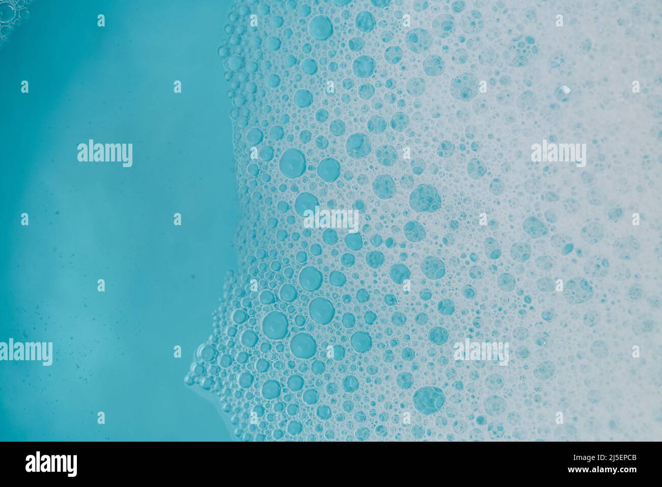 foam bubbles.Blue water with white foam bubbles.Foam Water Soap Suds ...