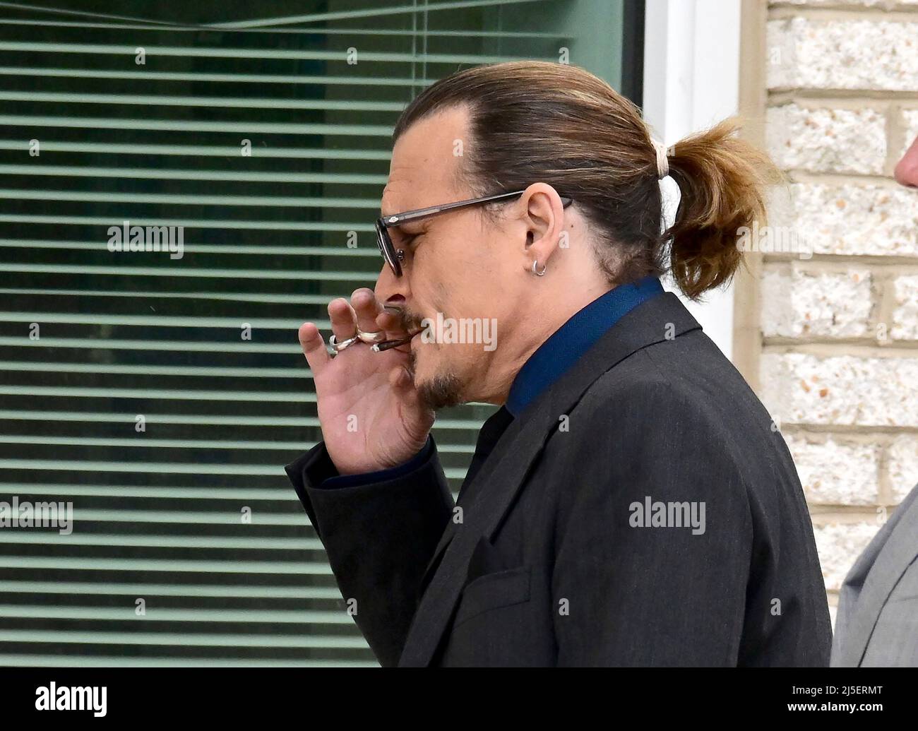 johnny depp tobacco Rolling Cigarette Editorial Stock Photo - Stock Image Johnny Depp smokes cigarette during