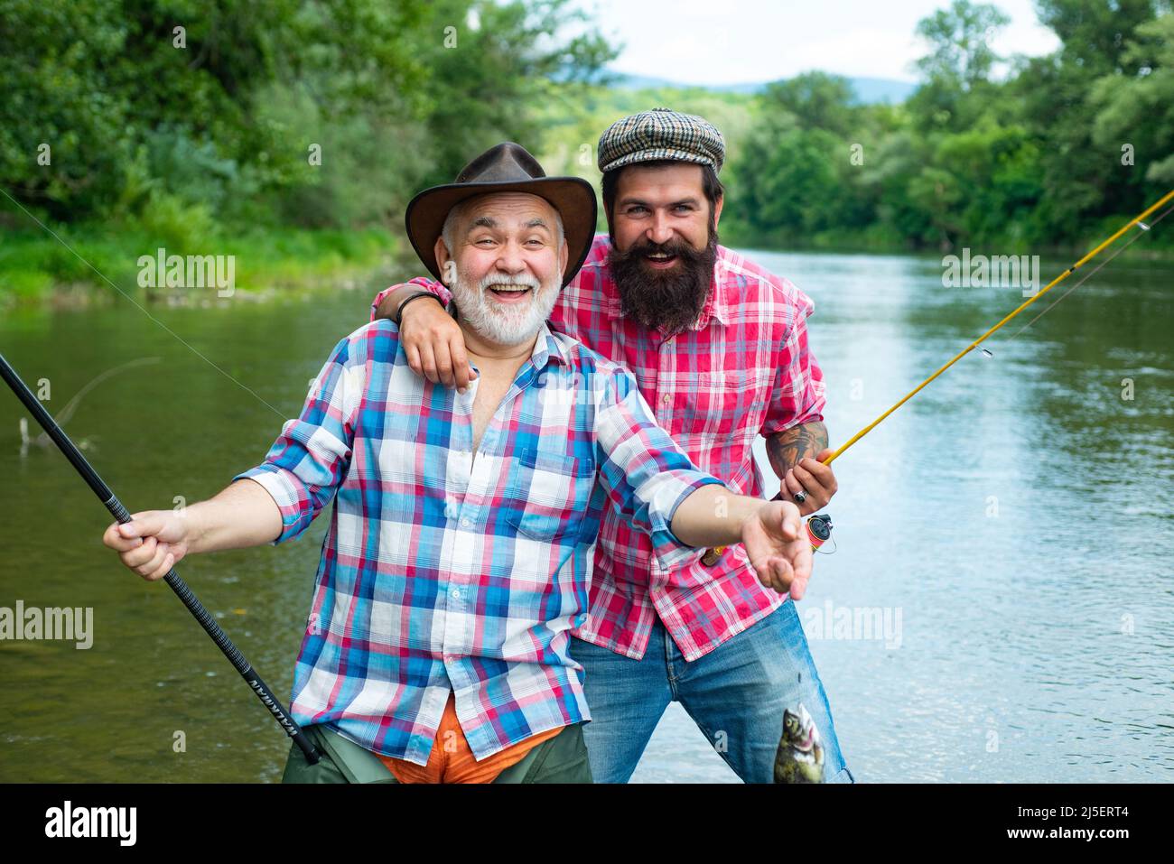 Man friends. Men hobby and recreation. Fishermen successful catch fish.  Fisher retirement. Retired businessman in suit with fishing rod. Male Stock  Photo - Alamy
