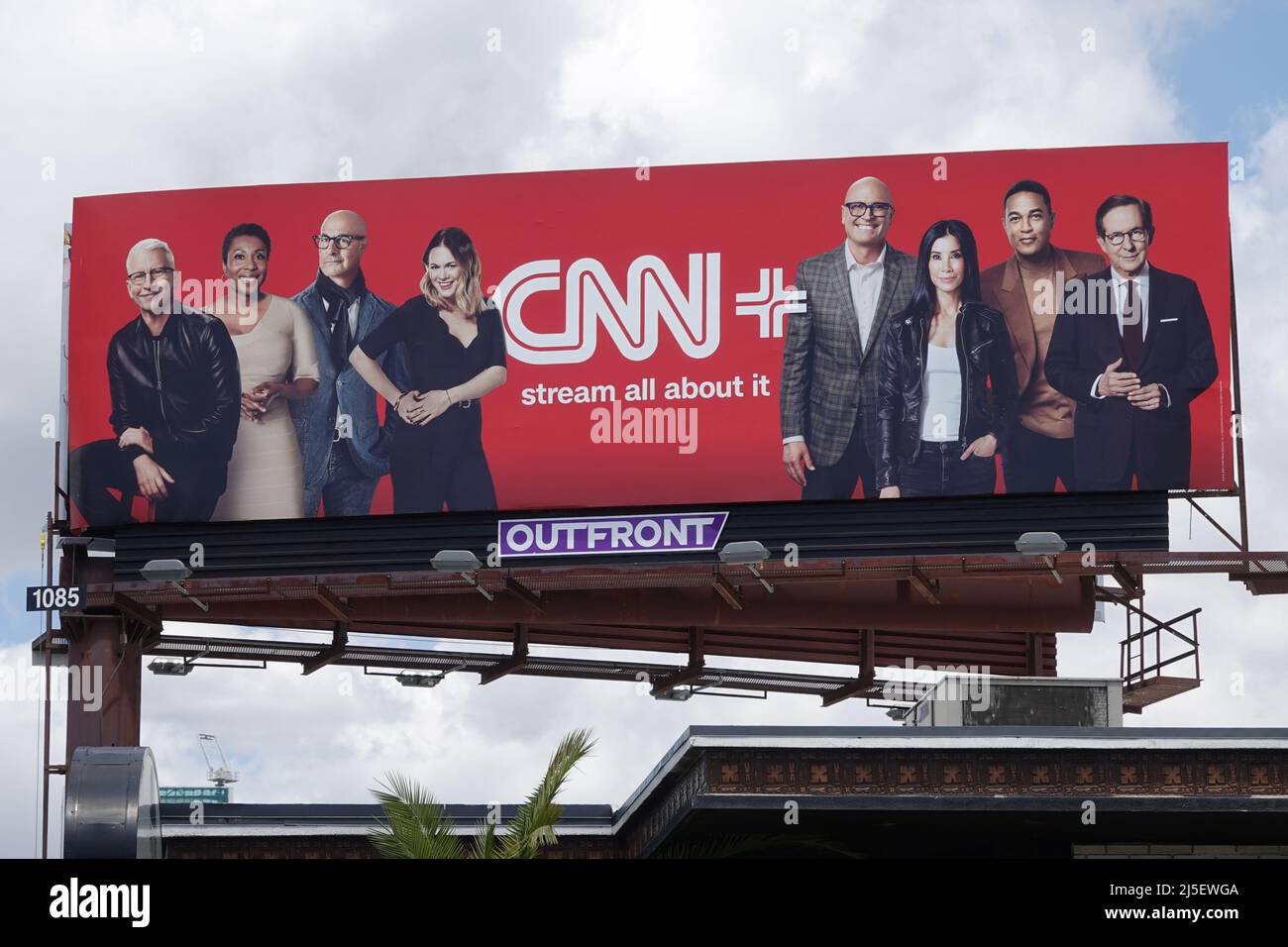 Los Angeles, CA / USA - April 22, 2022: Personalities featured on the CNN+ video streaming service are featured on a billboard atop a building. Stock Photo