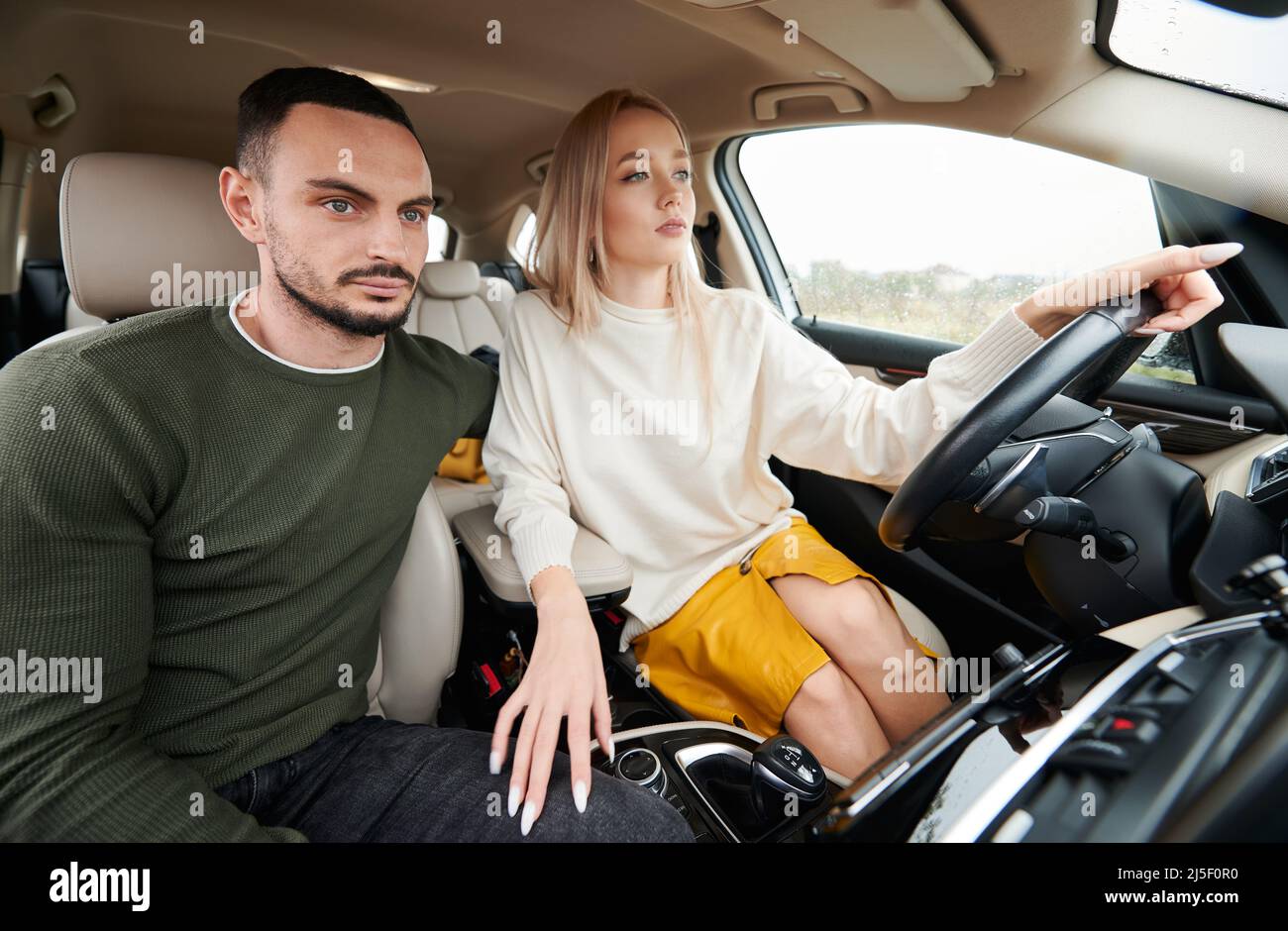 Family in car window man woman hi-res stock photography and images - Alamy