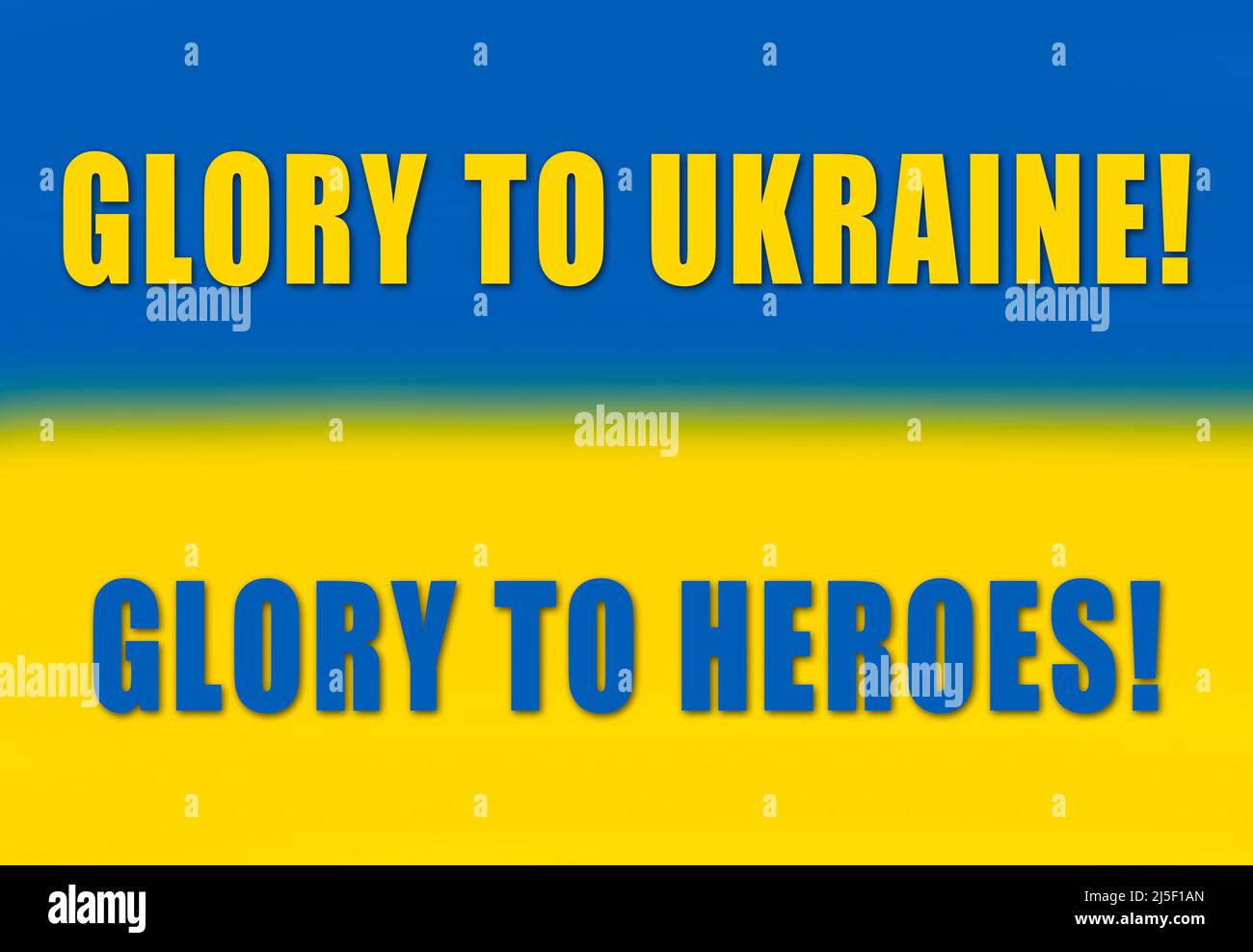 Stand with Ukraine: slogan Glory to Ukraine, Glory to Heroes on painted Ukrainian flag Stock Photo