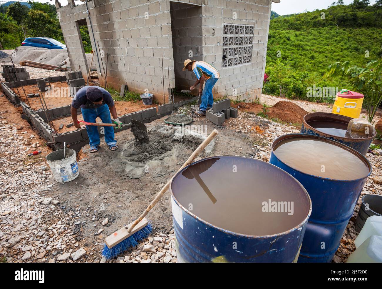 Construction workers are building a house with concrete blocks, Cocle province, Republic of Panama, Central America. Stock Photo