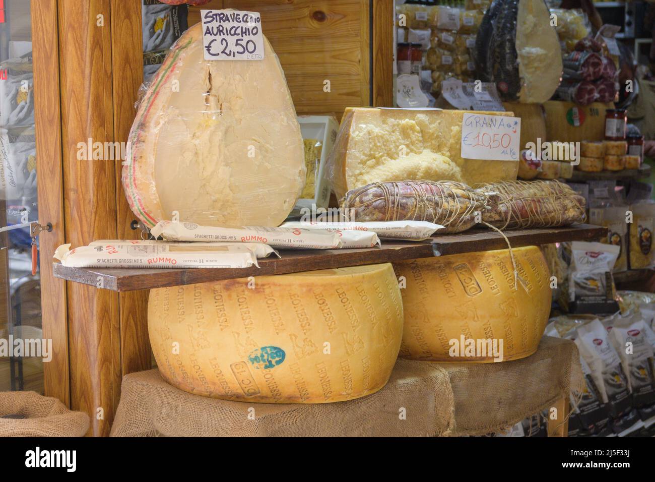 Regional cheeses on display in traditional latteria Via Pignasecca Naples Italy Stock Photo