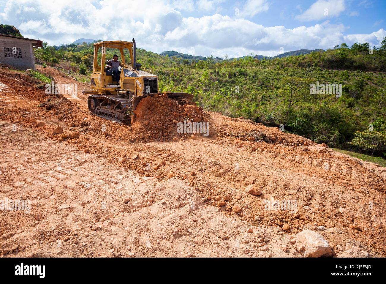 A bulldozer at work on a construction site at Las Minas, Cocle province, Republic of Panama, Central America. Stock Photo