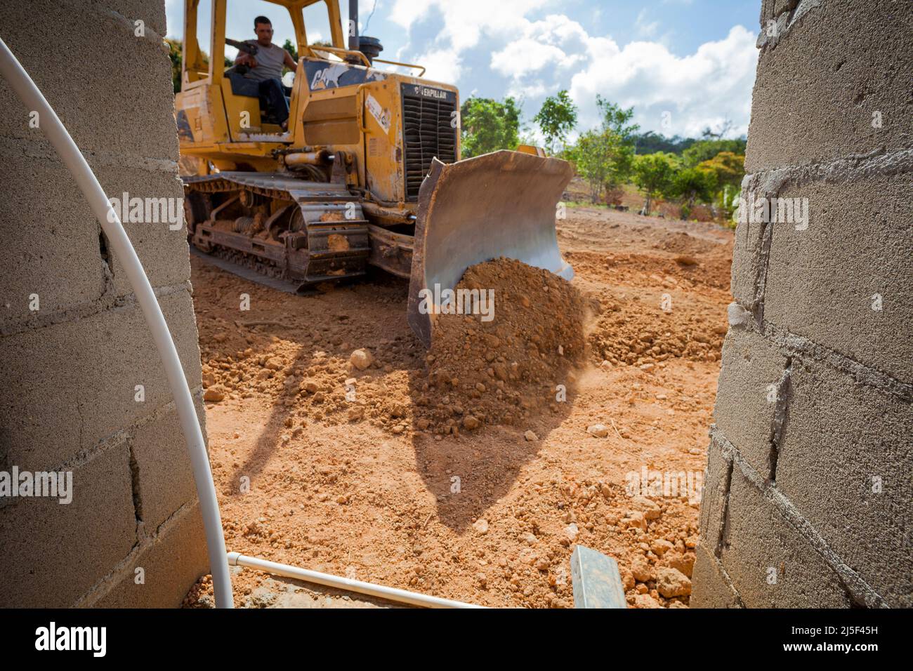 A bulldozer at work on a construction site at Las Minas, Cocle province, Republic of Panama, Central America. Stock Photo