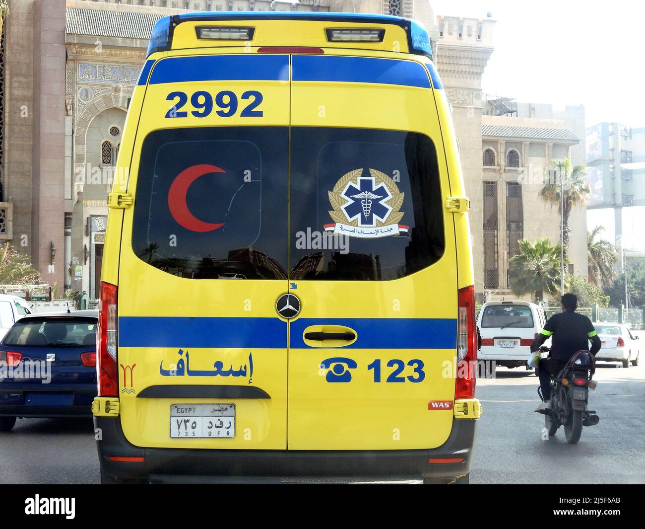 Cairo, Egypt, March 5 2022: Ambulance on the road responding for an emergency call of road accidents, Translation of Arabic text (ministry of health, Stock Photo