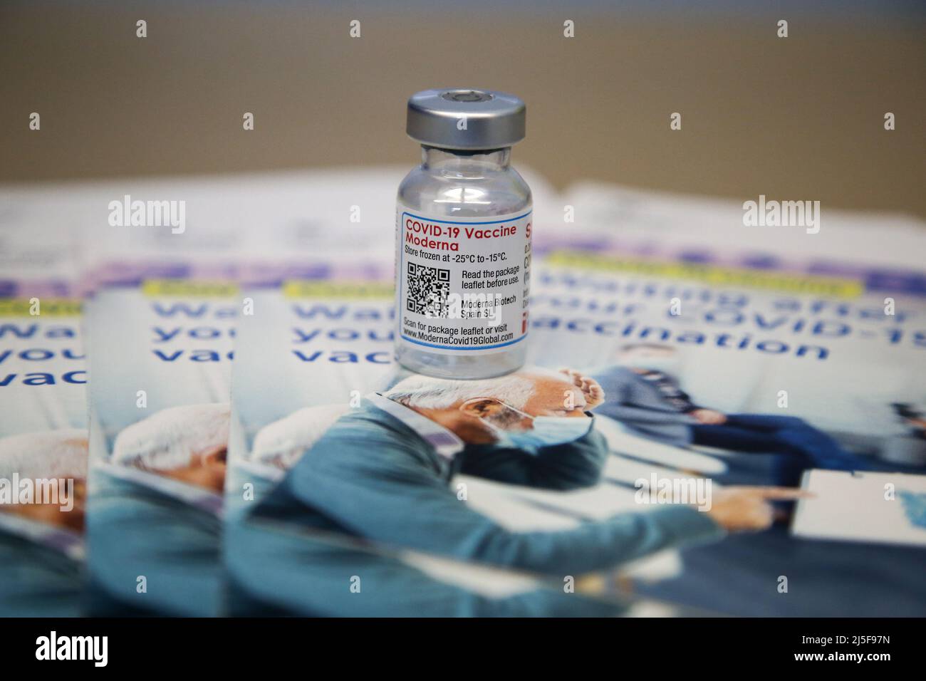 London, UK 22 Apr 2022 - A vail containing the Spikevax (Moderna) COVID-19 vaccine with COVID-19 vaccination information leaflet at a vaccination centre. Credit Dinendra Haria /Alamy Live News Stock Photo