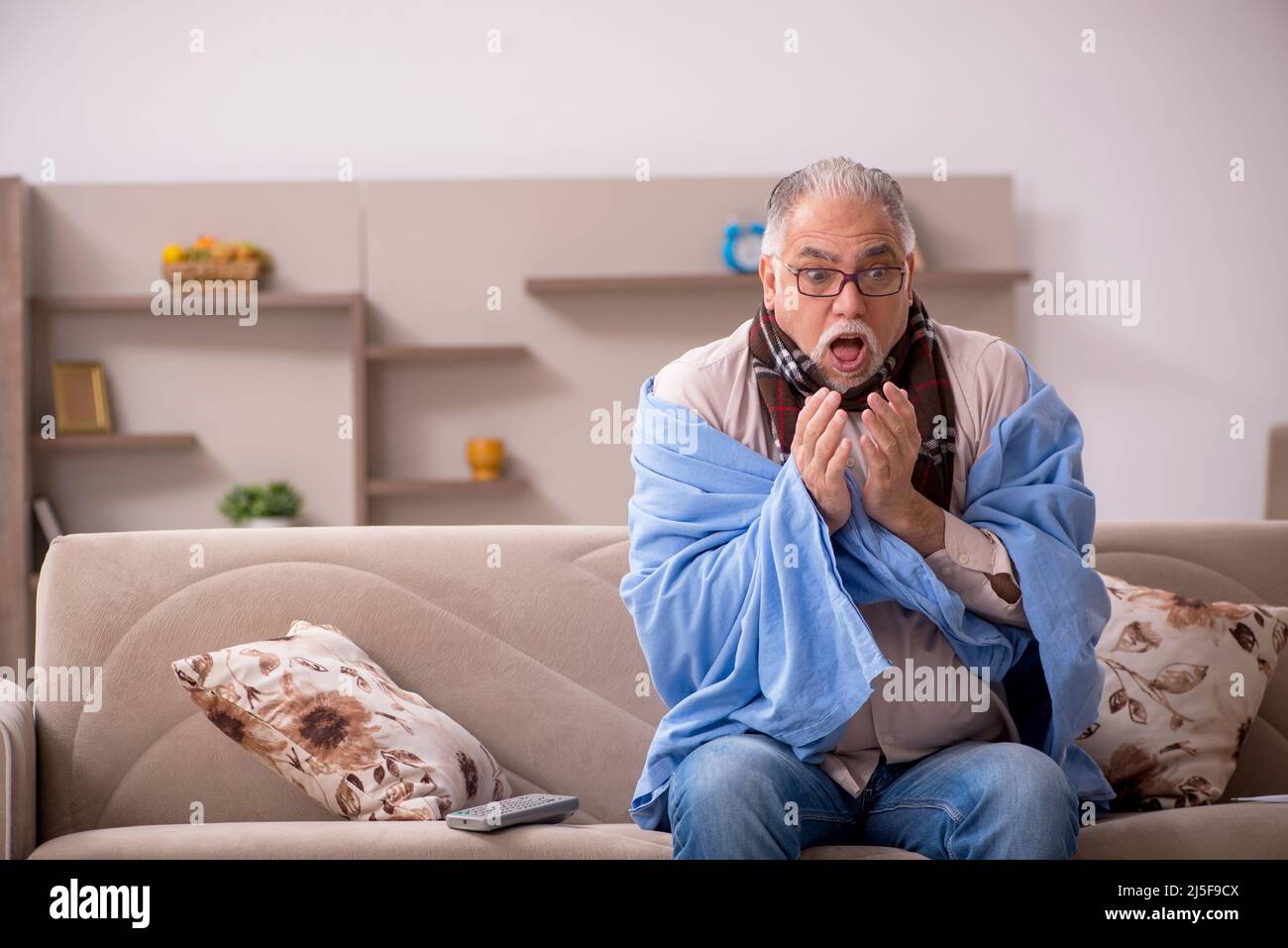 Sick old man coughing sitting hi-res stock photography and images - Alamy