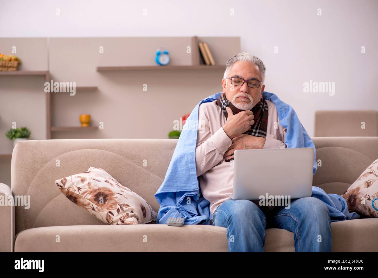Sick old man coughing sitting hi-res stock photography and images - Alamy