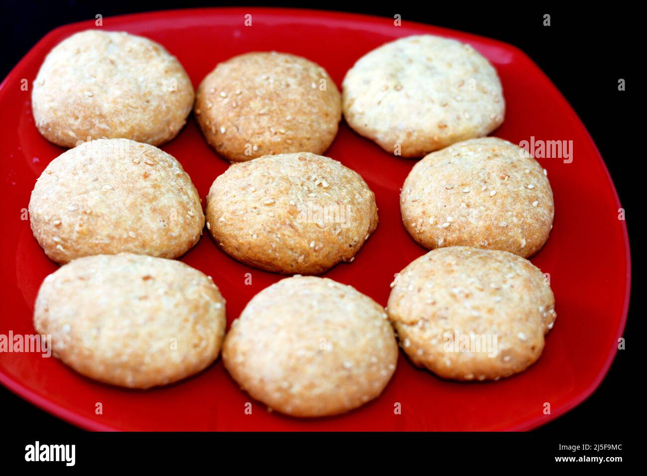 Arabic Egyptian oriental cuisine of dates filled cookies and covered with sesame, Maamoul Eid El