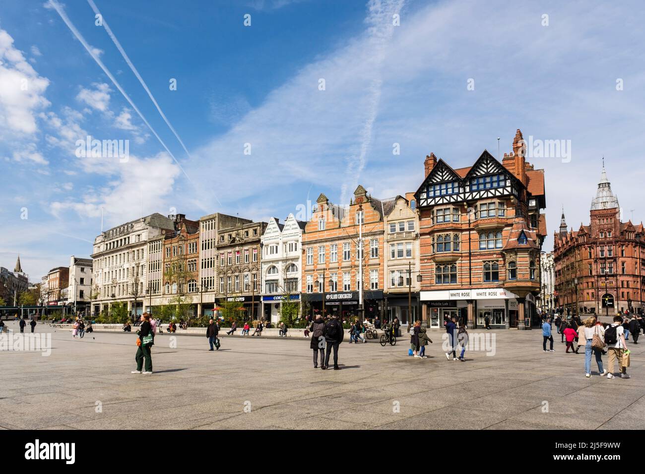 Shops around Old Market Square busy with shoppers in the city centre. Nottingham, Nottinghamshire, England, UK, Britain Stock Photo