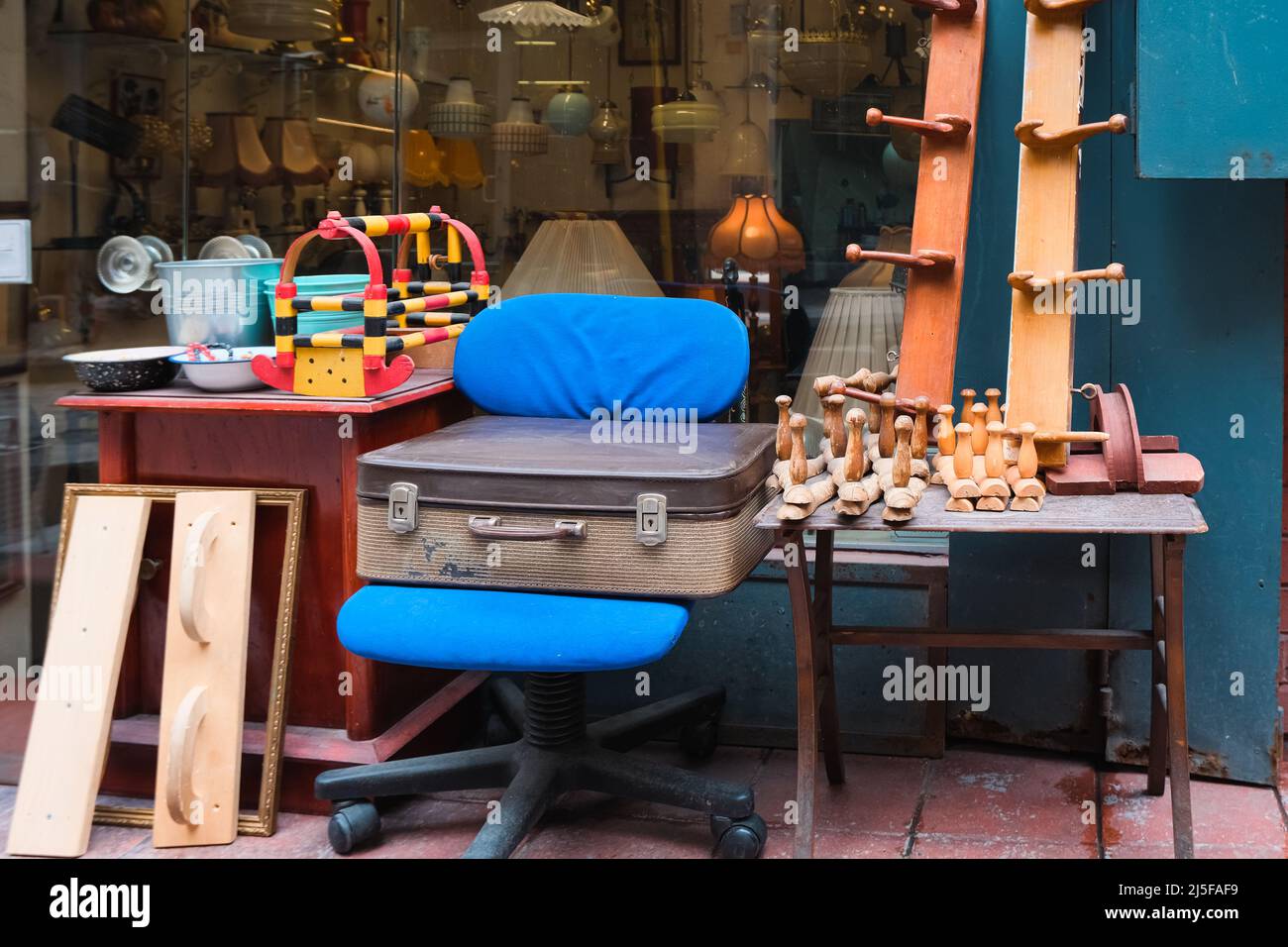 collection of old vintage dust stuff in antique shop. traditional asian