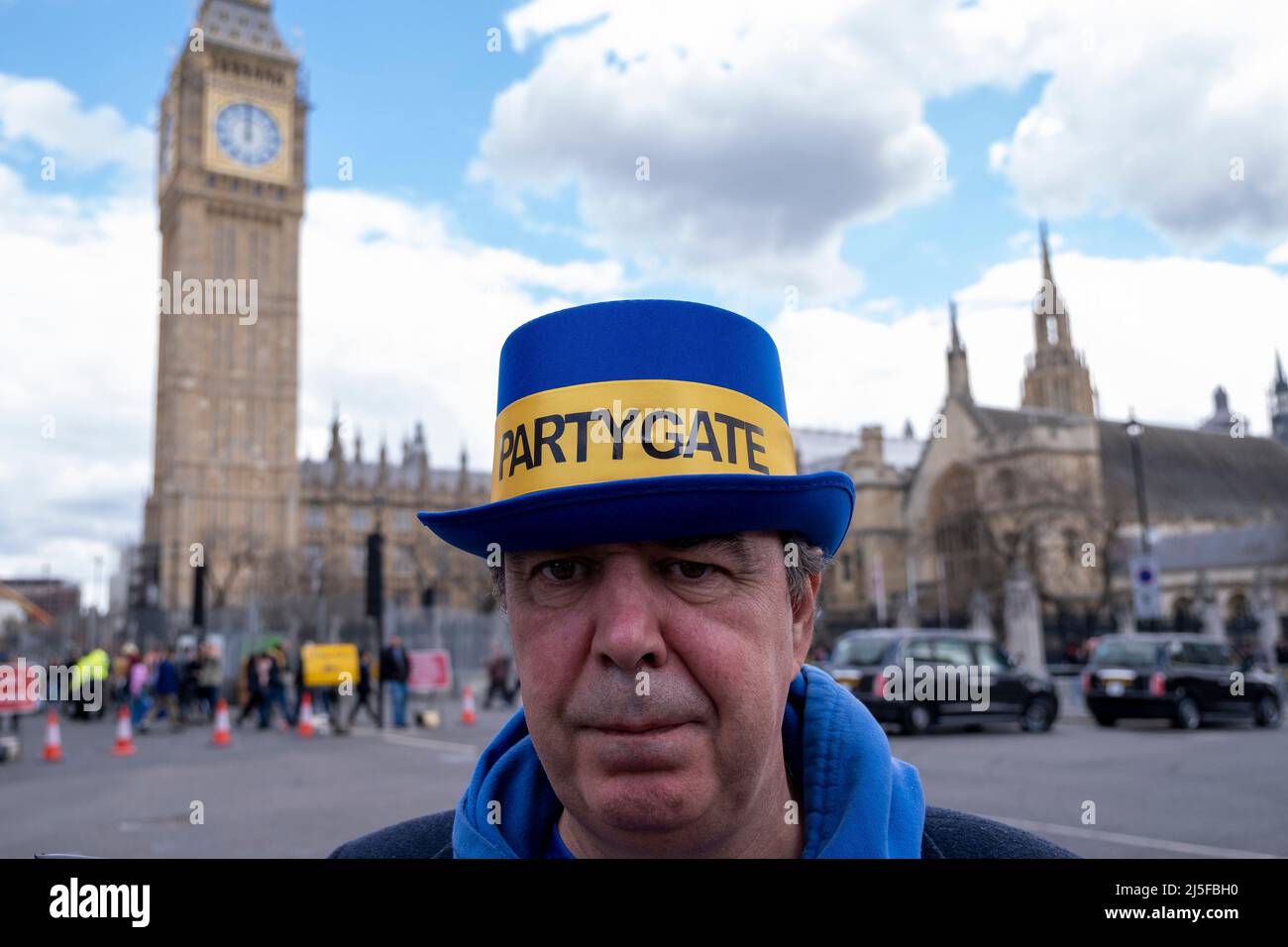 Protester Steve Bray wearing a Partygate hat and calling for Prime Minister Boris Johnson to resign following the Partygate affair and his recent fine by the Metropolitan police for breaching lockdown rules on 13th April 2022 in London, United Kingdom. Stock Photo