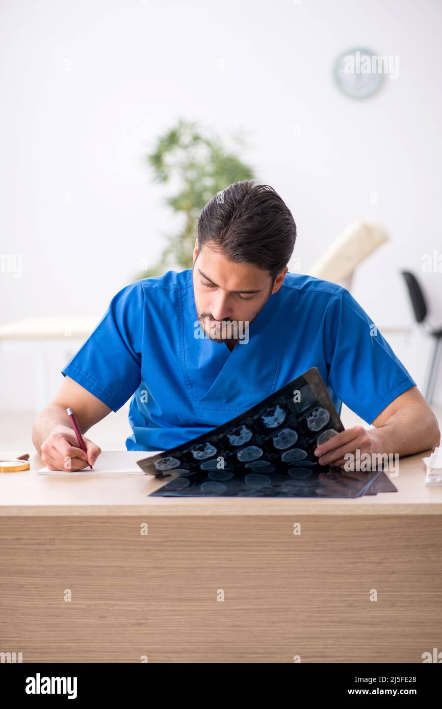 Hospital radiologist checking notes hi-res stock photography and images ...