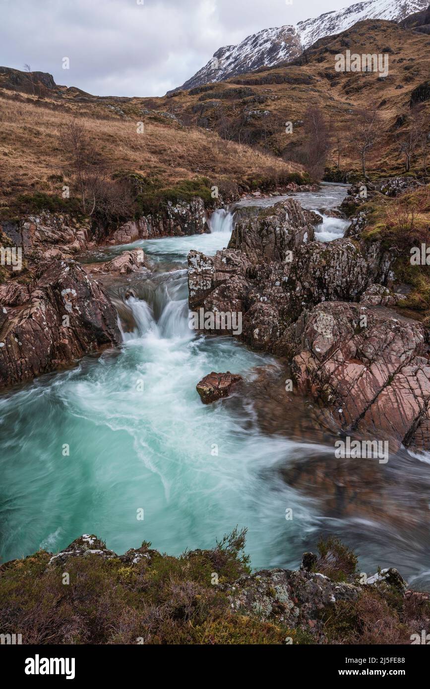 Beautiful landscape image of vibrant River Coe flowing beneath ...