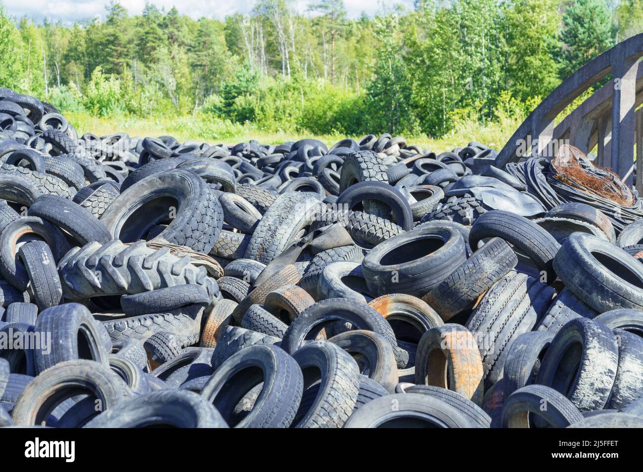 Dump of used automobile tires. Poisonous fumes into atmosphere