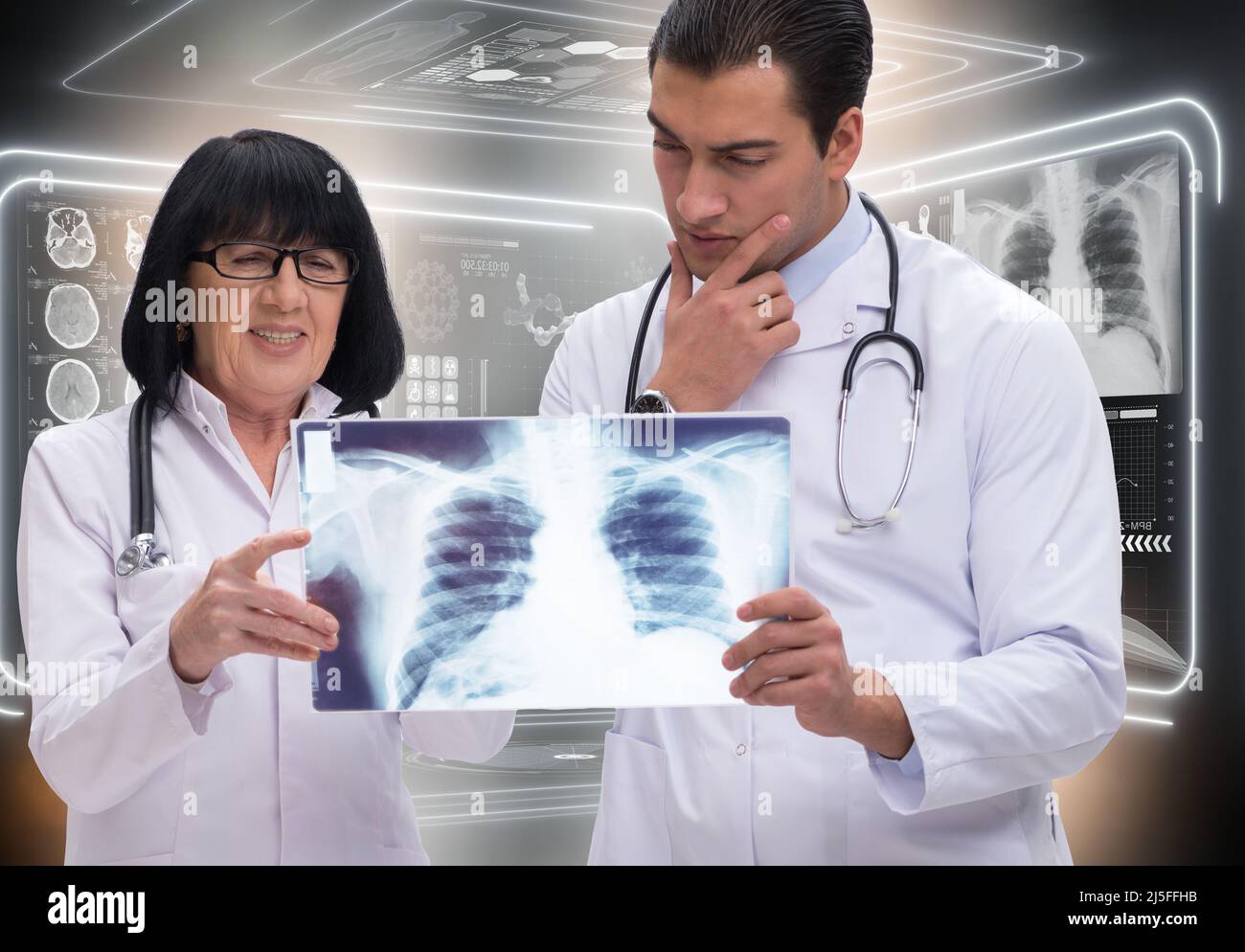 The two doctors looking at x-ray image Stock Photo - Alamy