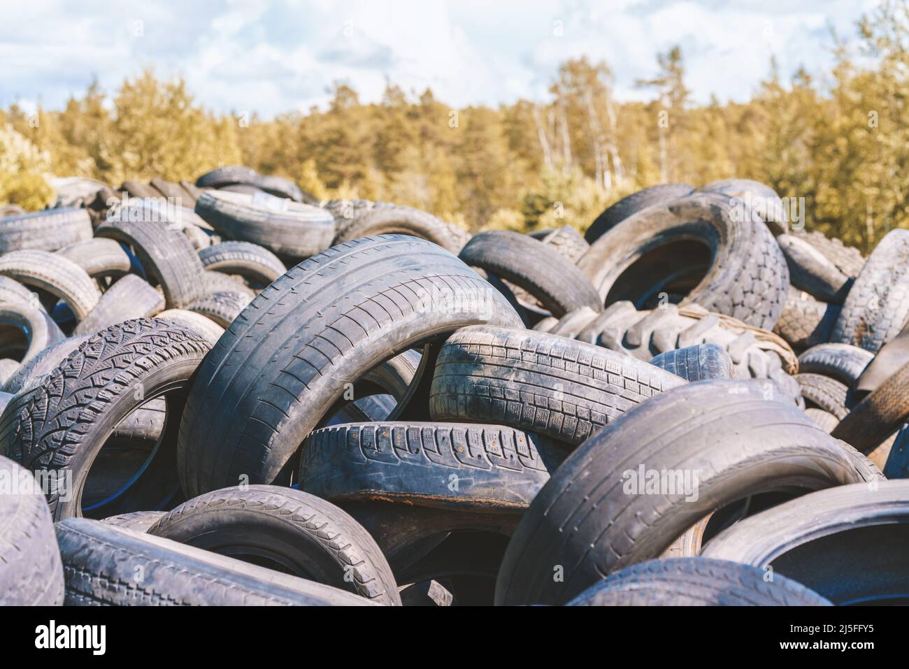 Dump of automobile tires. Poisonous fumes into the atmosphere