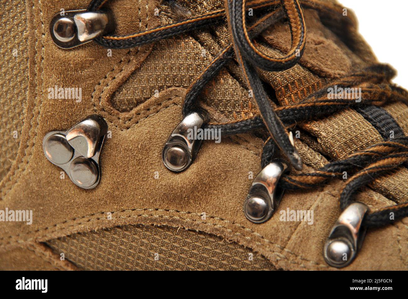 Hiking shoes and a white background, Sturdy hiking boots, strong hiking