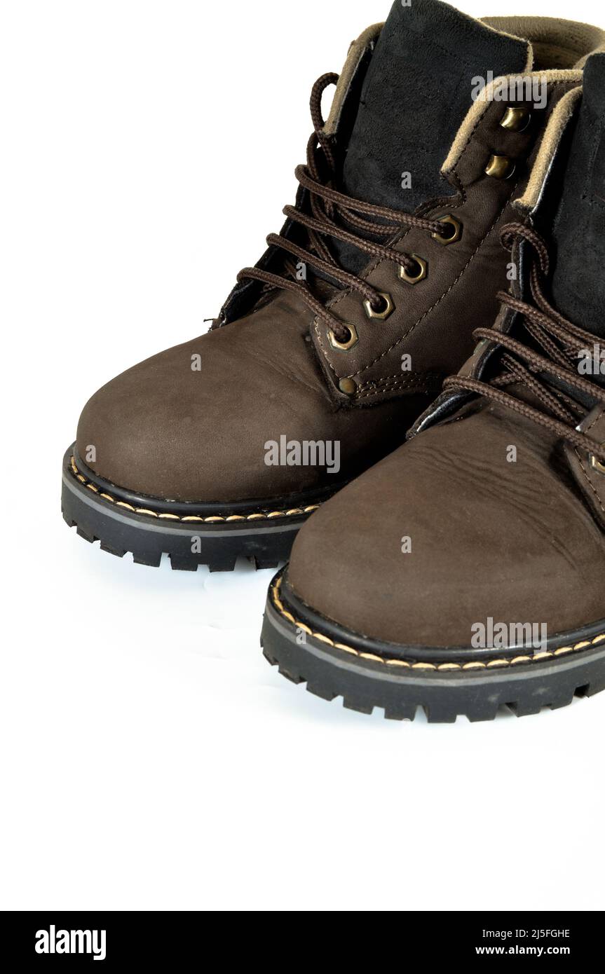 Hiking shoes and a white background, Sturdy hiking boots, strong hiking