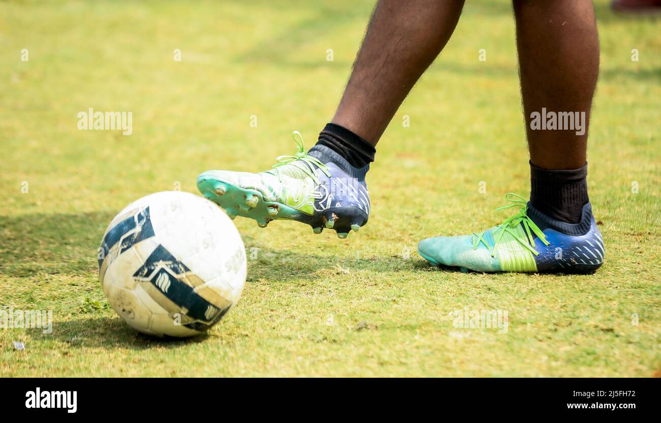 soccer player kicking ball Stock Photo Alamy