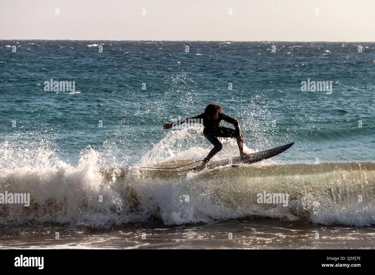 Surfer, Playa Penita, Puerto del Carmen, Lanzarote, Kanarische Inseln, Kanaren, Spanien Stock Photo