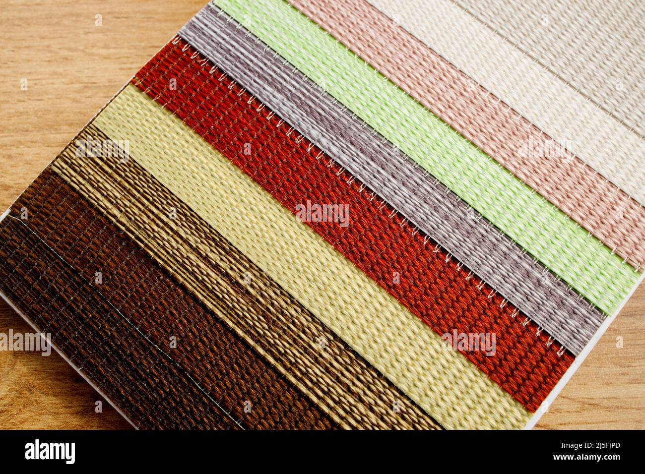 Samples of textured fabrics of different colors for the manufacture of