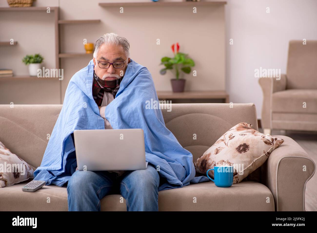 Sick old man coughing sitting hi-res stock photography and images - Alamy