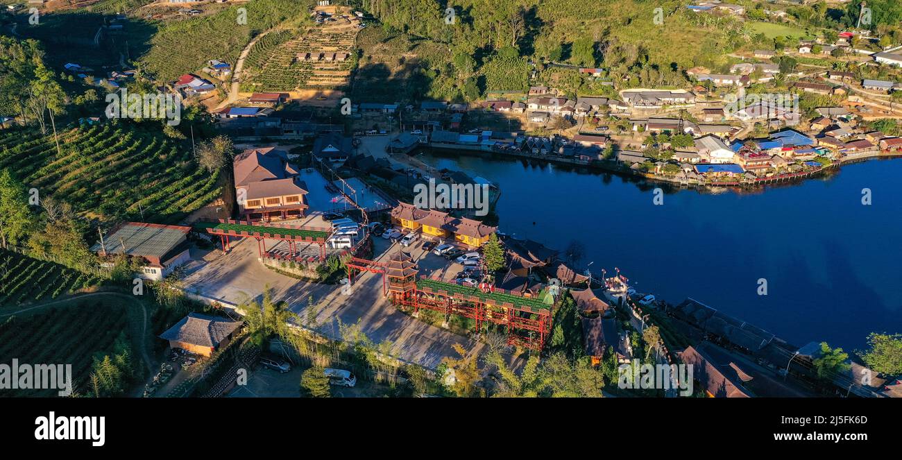 Aerial view of Sunrise with fog over Ban Rak thai, chinese village near ...