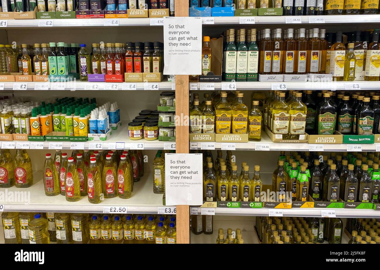 Cooking oil on shelves in a Tesco store in Ashford, Surrey
