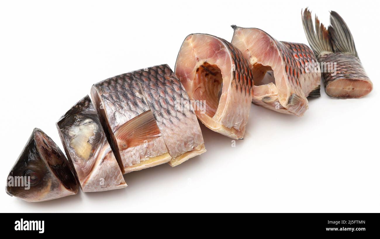 Popular rohu fish sliced and frozen over white background Stock Photo ...