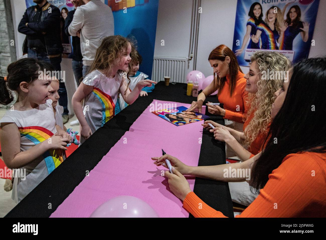 2022-04-23 11:52:48 BERGEN OP ZOOM - The Belgian girl group K3 with from left to right Hanne Verbruggen, Julia Boschman and Marthe DePillecyn will sign the new album Waterval during Record Store Day. Many fans, both young and old, stood in a line of more than a hundred meters for a long time. ANP KIPPA PAUL BERGEN netherlands out - belgium out Credit: ANP/Alamy Live News Stock Photo