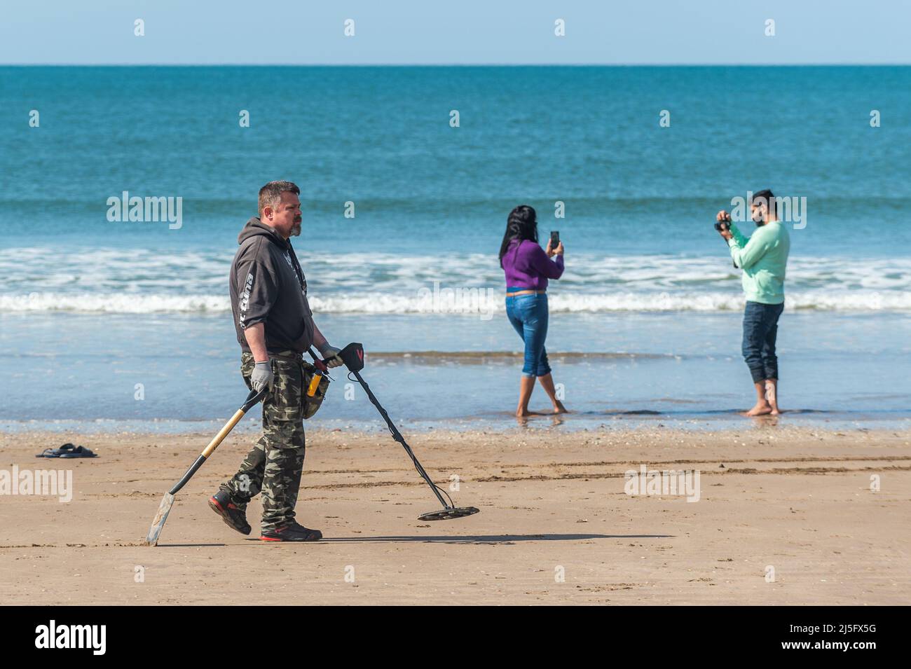 Inch Beach, County Kerry, Ireland. 23rd Apr, 2022. The sun shone on Inch Beach, County Kerry today. Despite the sunshine and warm temperatures, the beach was relatively quiet, but getting busier. Credit: AG News/Alamy Live News Stock Photo