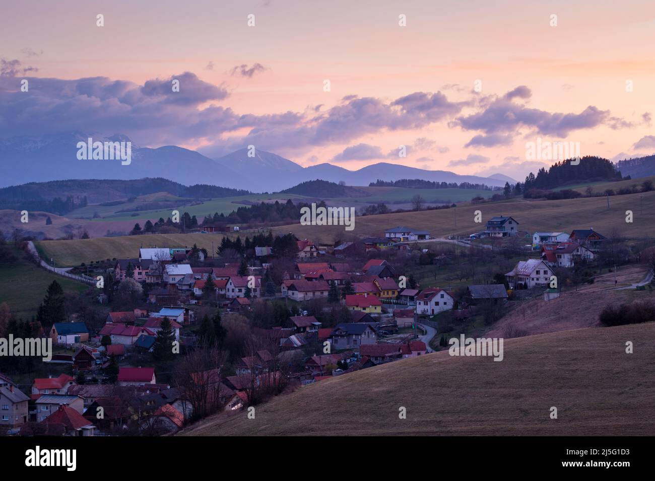 Village of Turcianske Jaseno and Mala Fatra mountains, Slovakia. Stock Photo