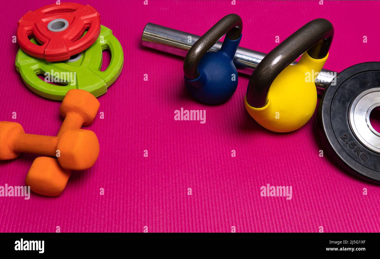 Red dumbbells rod weight sport yellow blue metal health, for gym lifestyle from healthy for shiny template, view beauty. Empty nobody background, Stock Photo