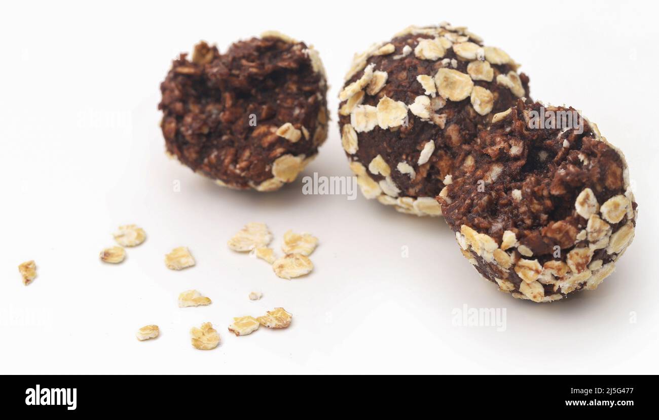 Oatmeal balls, a popular Christmas candy over white background Stock