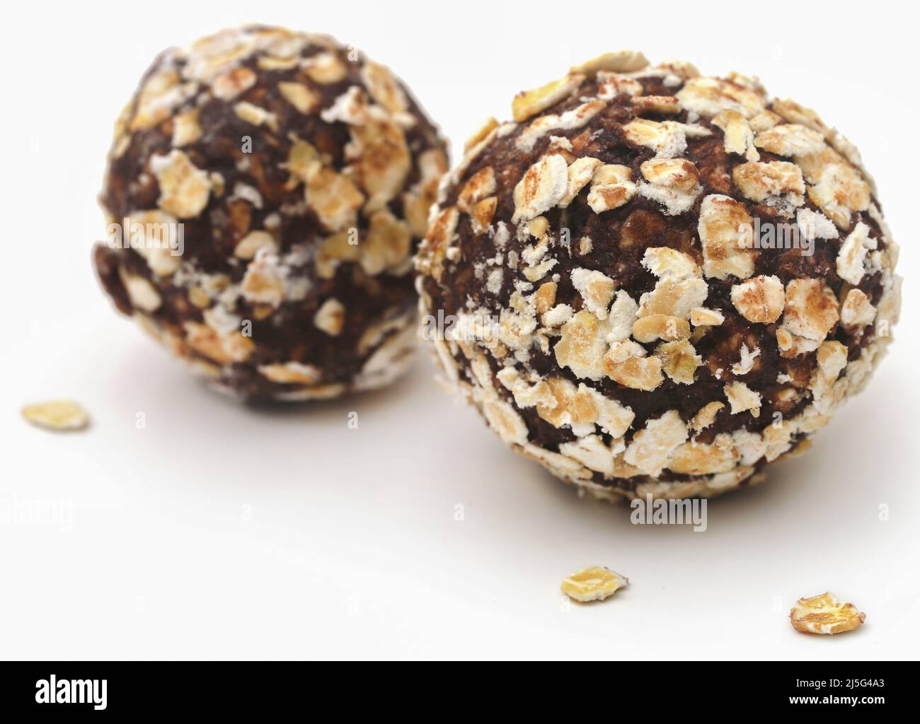 Oatmeal balls, a popular Christmas candy over white background Stock