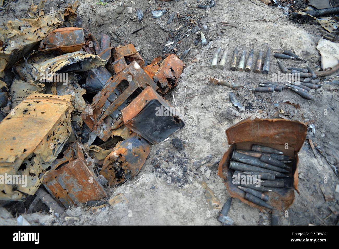 BERVYTSIA, UKRAINE - APRIL 21, 2022 - Ammunition found by Ukrainian forensic investigators lies on the ground in the village of Bervytsia liberated fr Stock Photo