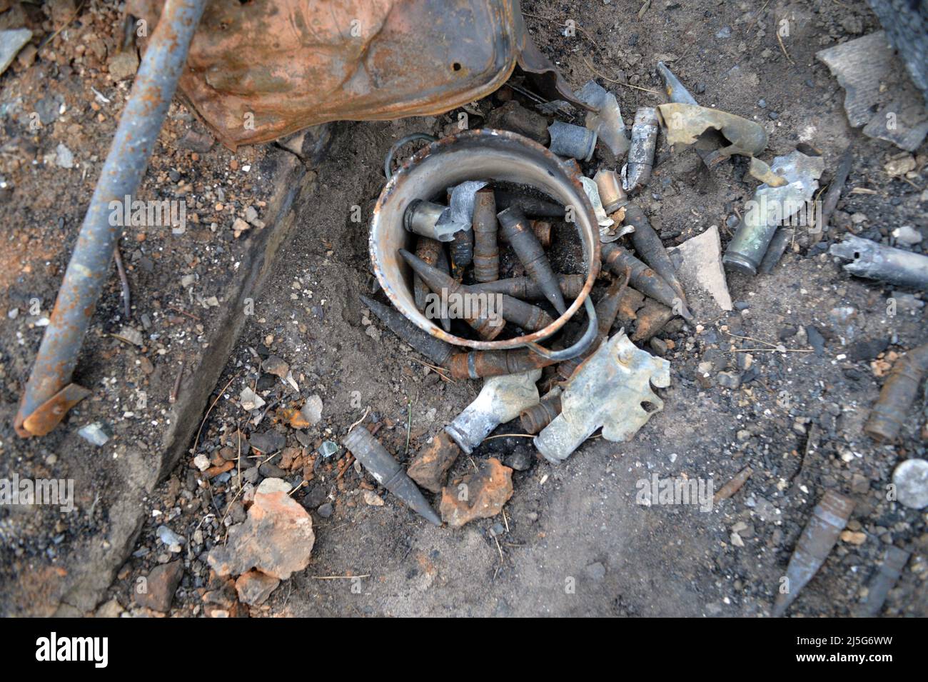 BERVYTSIA, UKRAINE - APRIL 21, 2022 - Ammunition found by Ukrainian forensic investigators lies on the ground in the village of Bervytsia liberated fr Stock Photo