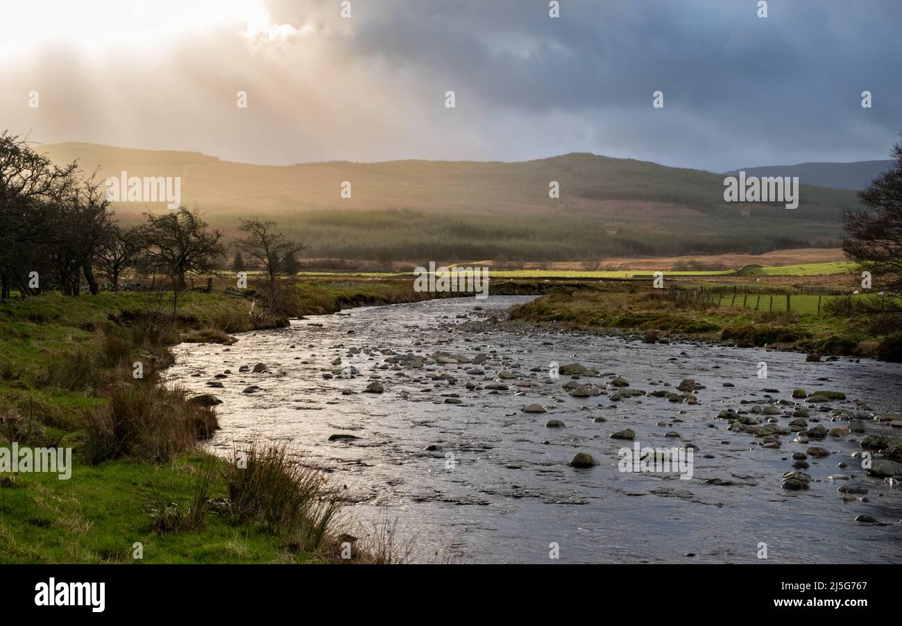 The Water of Deugh near Carsphairn at sunset in winter, Dumfries and Galloway, Scotland Scotland Stock Photo