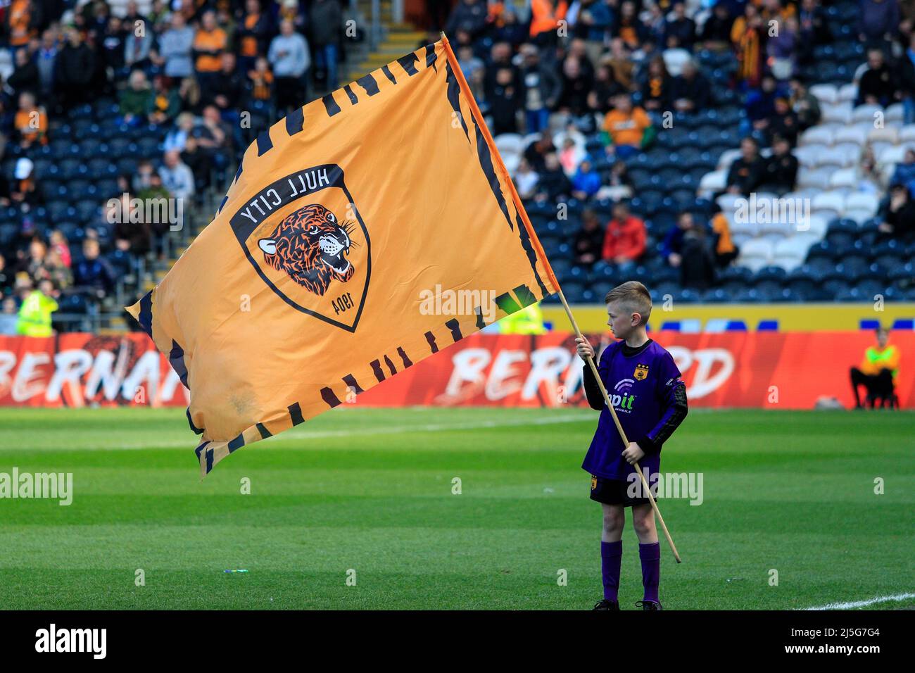 A Hull City mascot flies a Hull City flag as the two teams prepare to come  out of the tunnel Stock Photo - Alamy